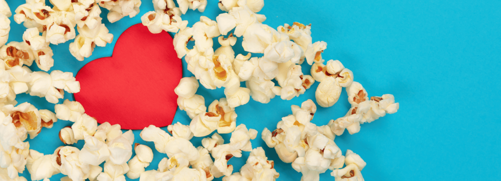 heart surrounded by popcorn for national popcorn month